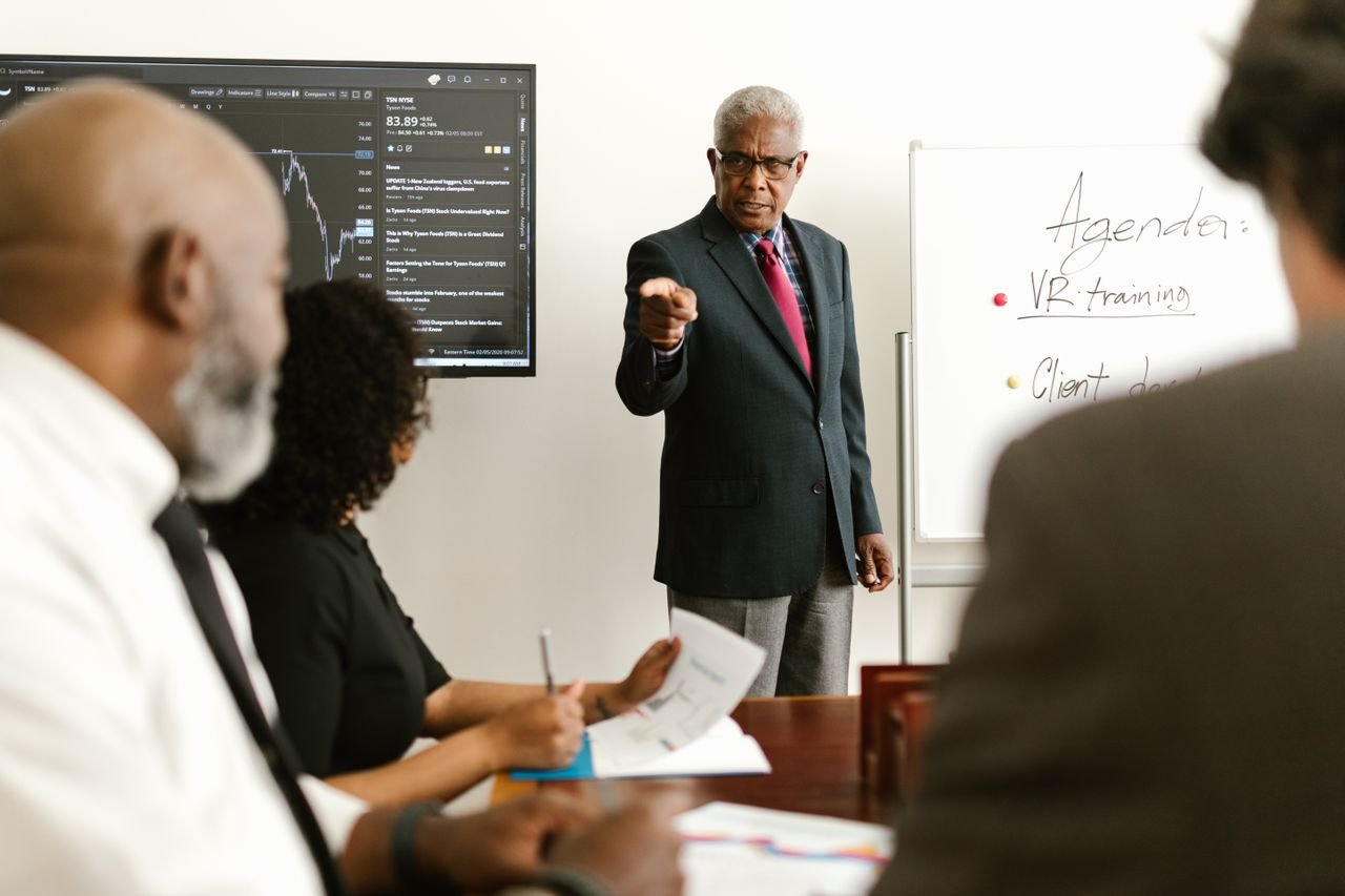 Insurance agent presenting to a group during a training session